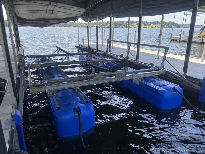 view of a hydrohoist boat lift inside a marina