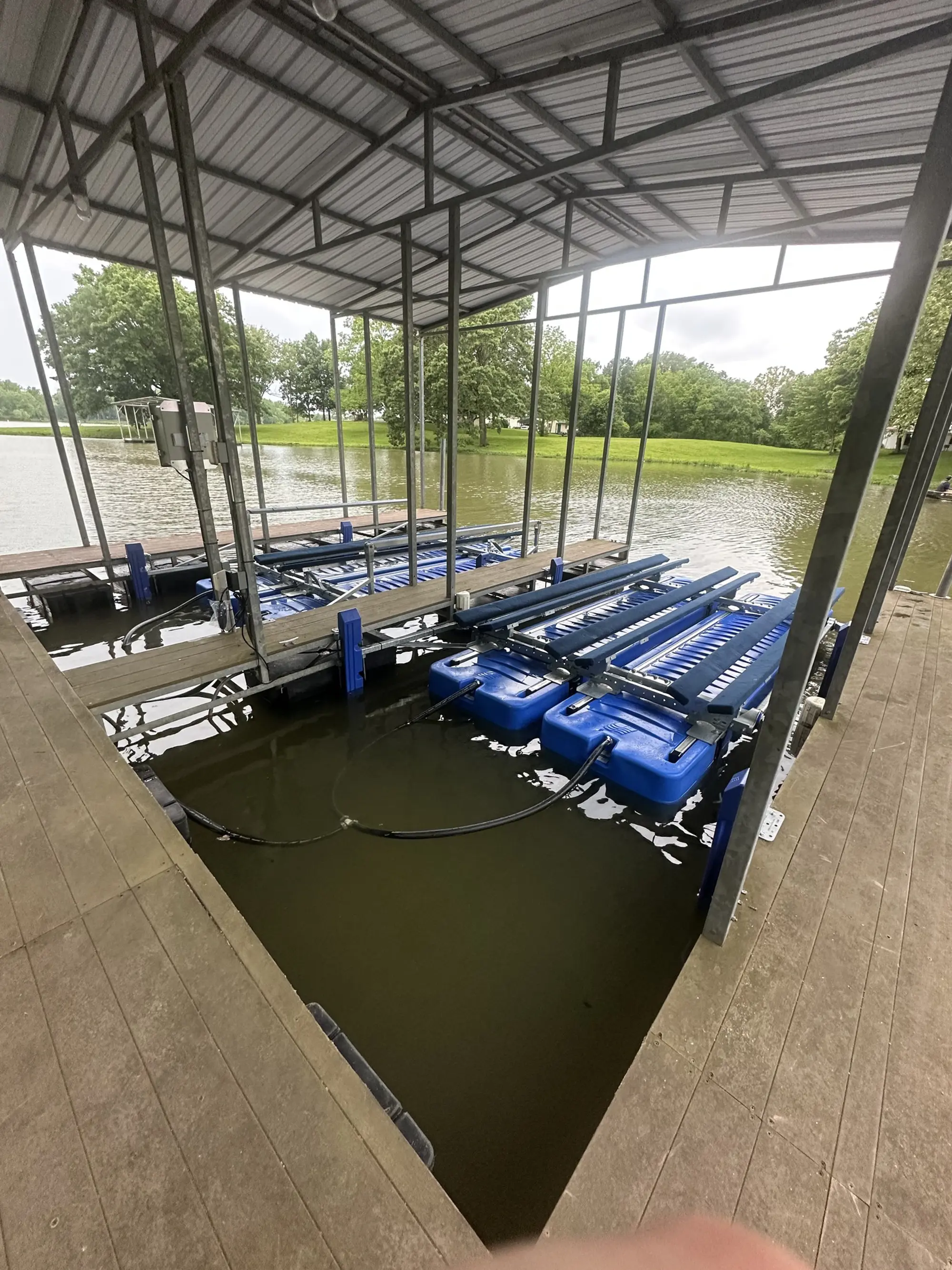 Shallow Water UltraLift installed at a covered freshwater dock