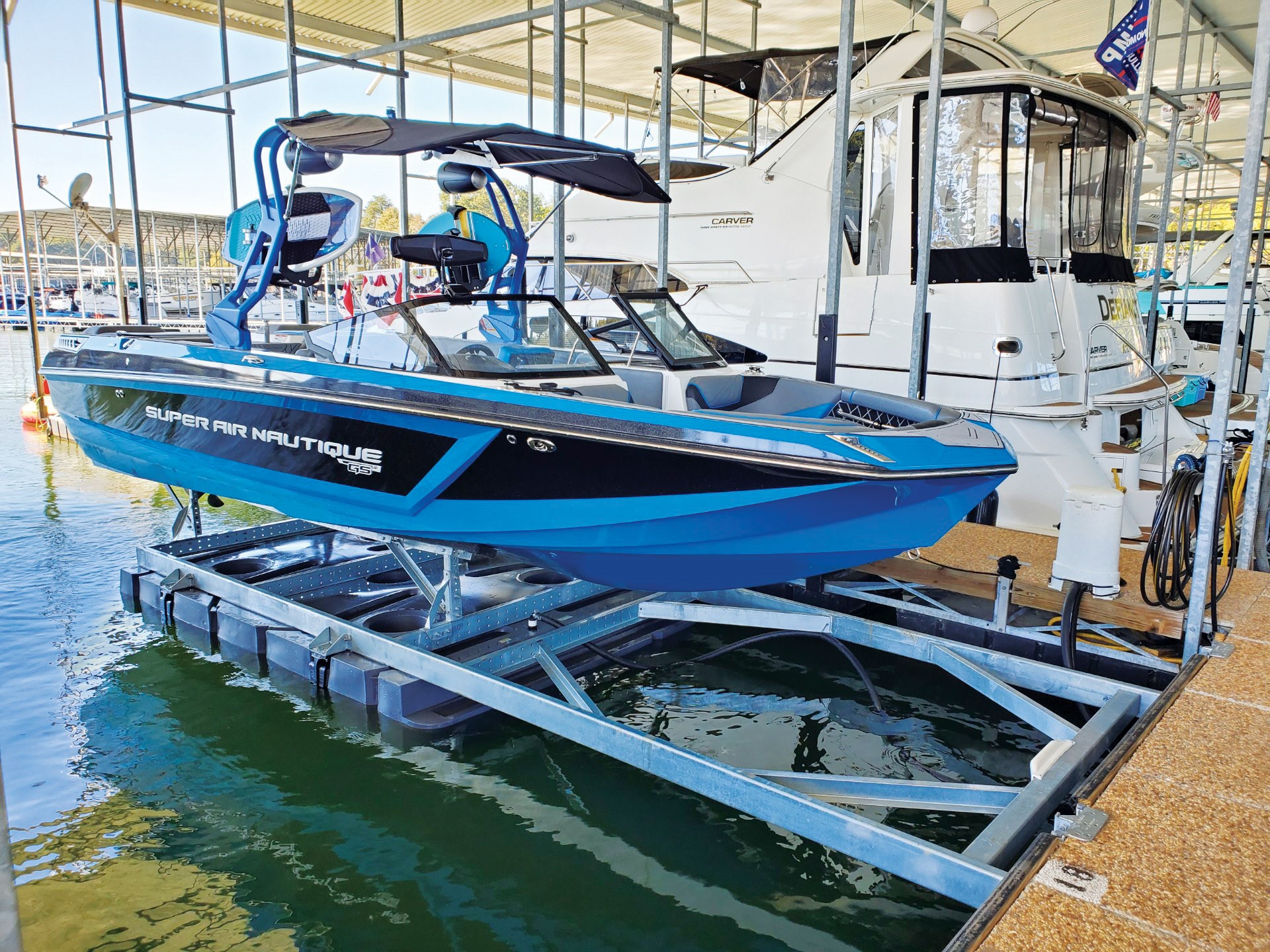super-air-nautique-on-frontmount-boat-lift-by-hydrohoist.jpg